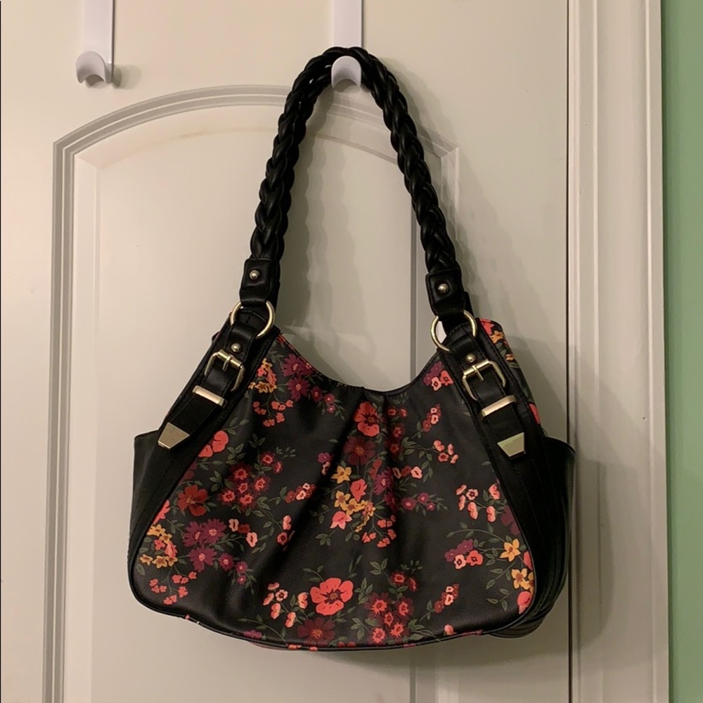 Purse with braided handles.